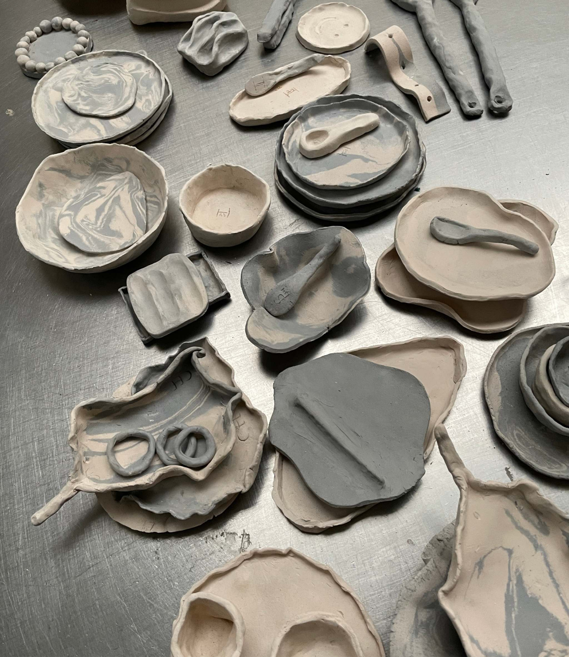 Swirl clay creations from a beginners' ceramics workshop.