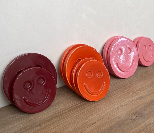 Orange/Red 'HAPPY' ceramic artwork